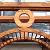 cedar fence and arbor on retaining wall